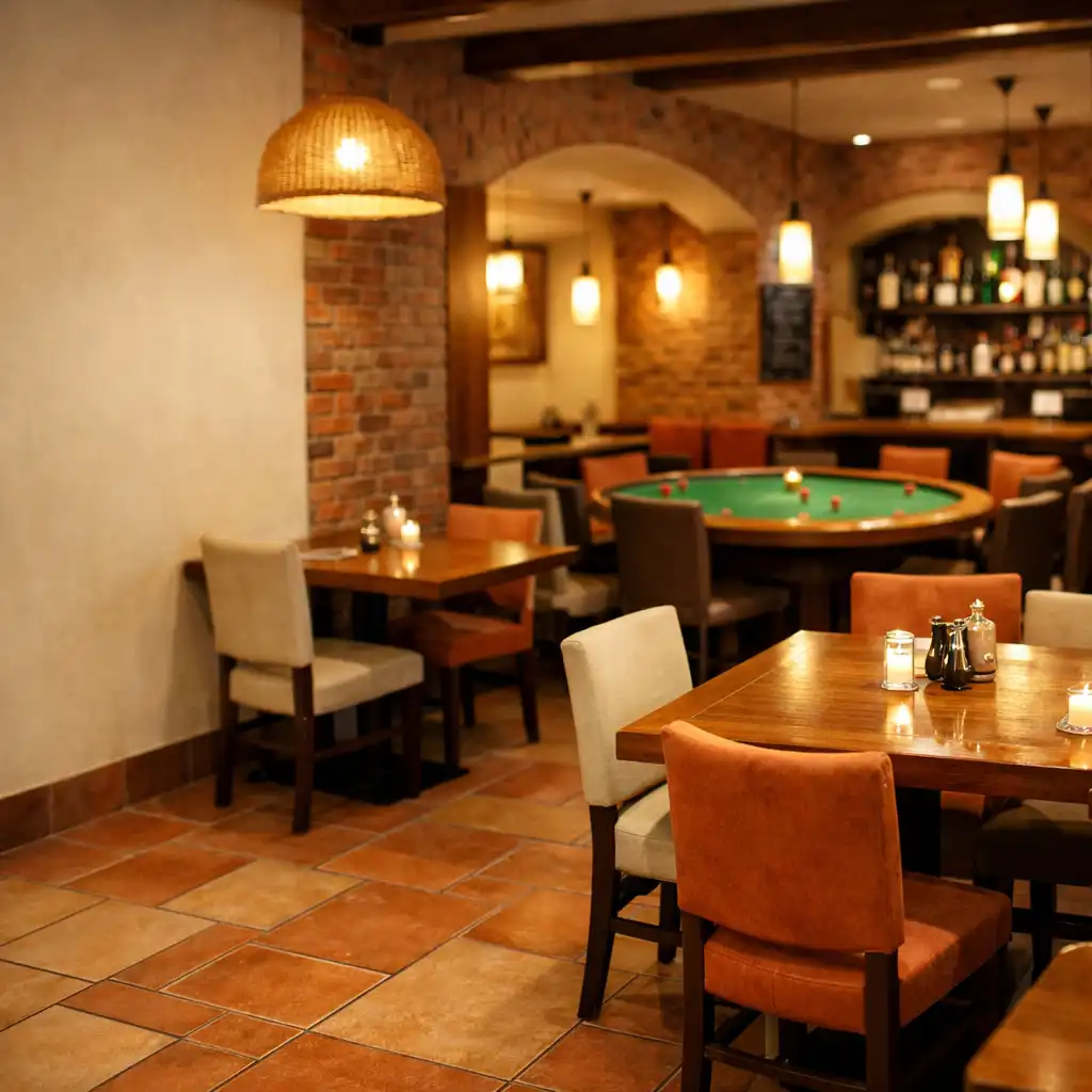 Interiér restaurace Gurmánský Dvůr s keramickou dlažbou a náznakem pokerového stolu